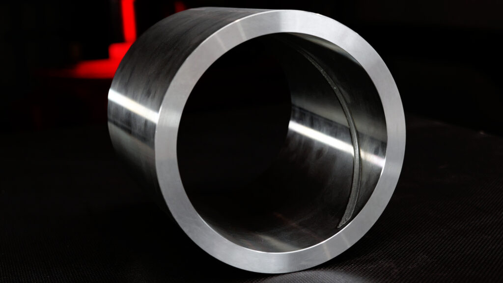 Inner cylinder surface with a welding spiral